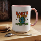 Earth is for Everyone — 15oz — Pink - accent — angled lifestyle