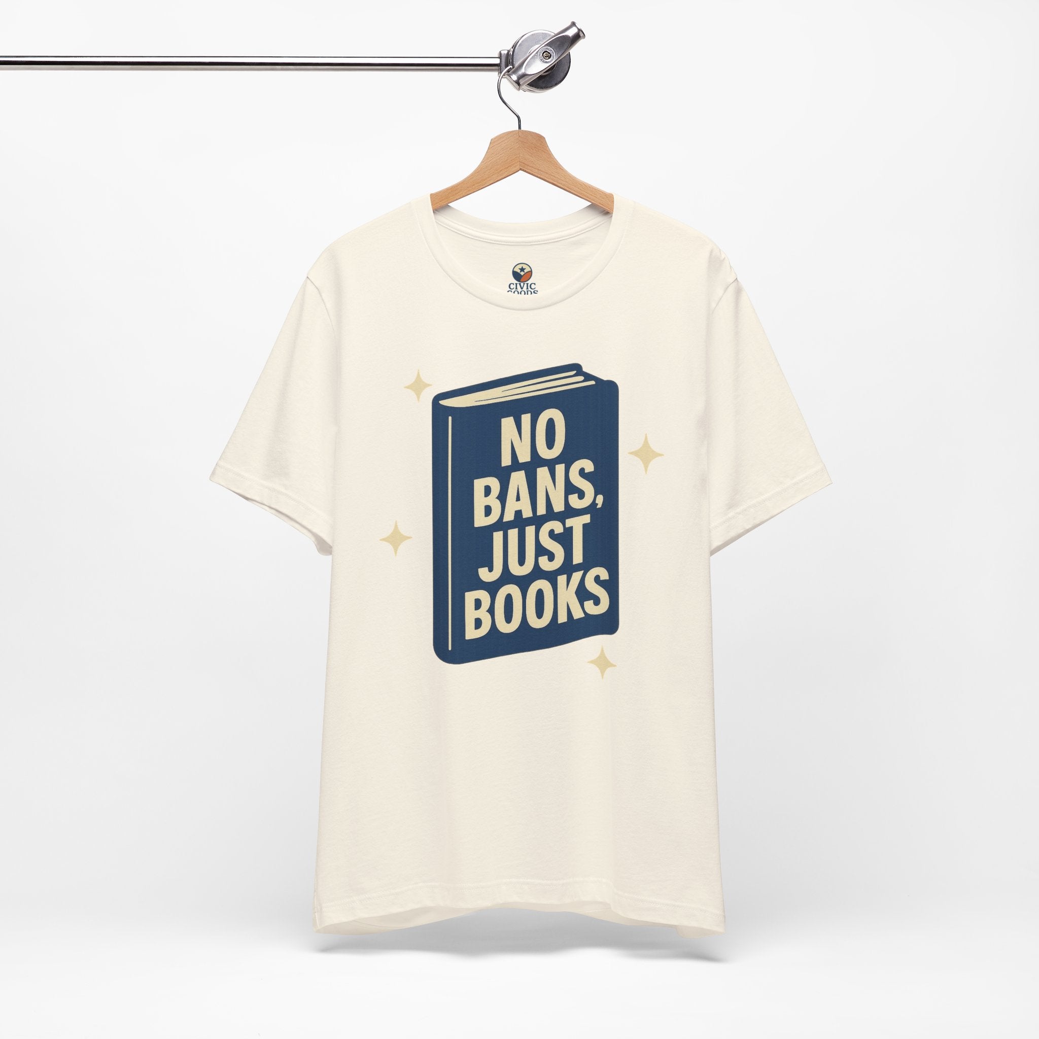 No Bans, Just Books tee  — Natural- accent — angled hanging
