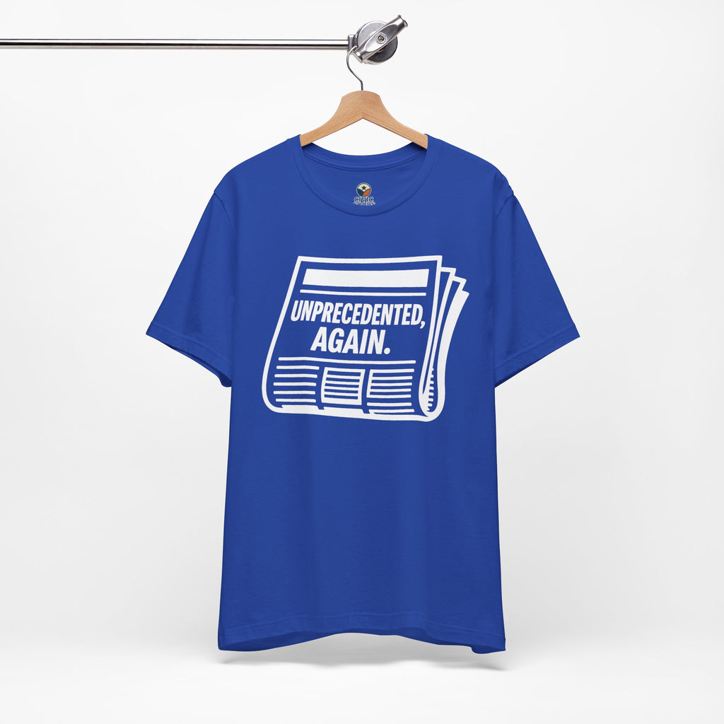 Unprecedented Again tee— True Royal - accent — angled hanging
